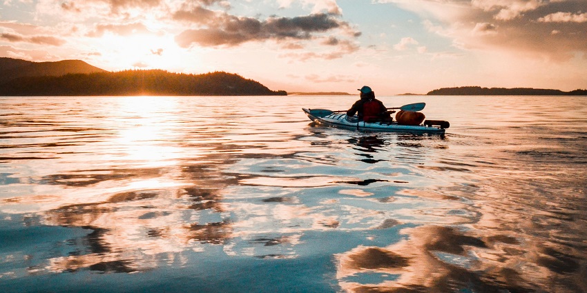 An image of a kayaker in Vancouver Island, a famous place for kayaking in Canada.