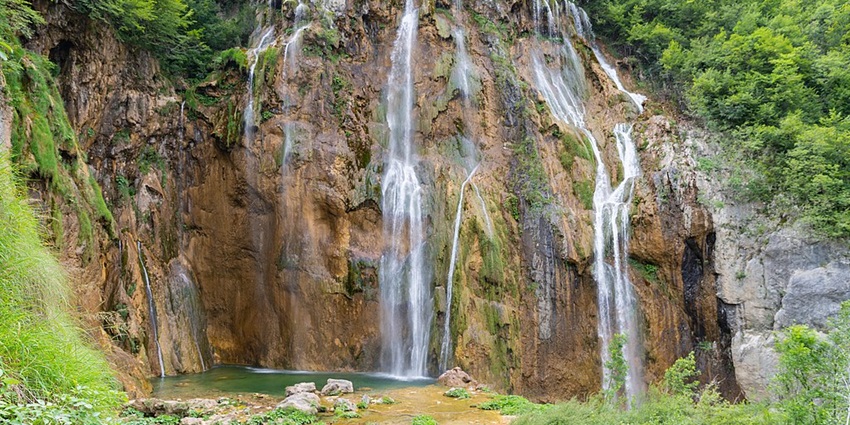 A close-up view of Veliki Slap waterfall, one of the tallest Plitvice waterfalls.