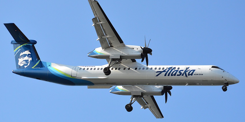 An aerial view of an airplane landing on runway 27, one of the airports in Vancouver.