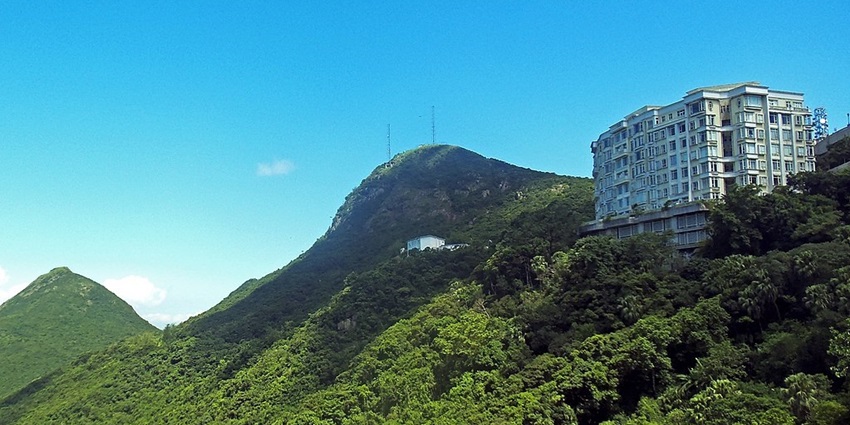 Scenic view of the iconic peak from Victoria Gap, showcased in Hong Kong travel guide