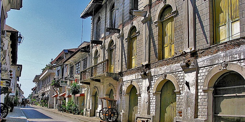 Spanish colonial architecture, cobblestone streets, rich cultural heritage preserved.