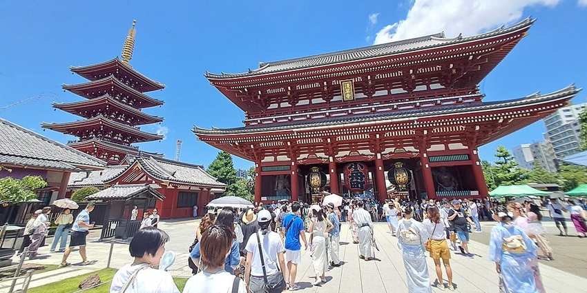 Tourists flocking the historic Senso-ji temple in Asakusa.