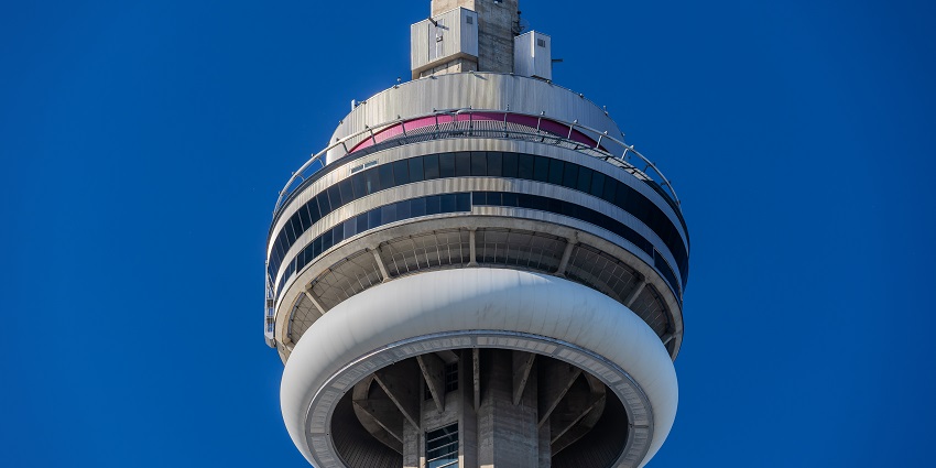 The main pod of CN Tower featuring the edge walk on the outside of the structure and various glass windows