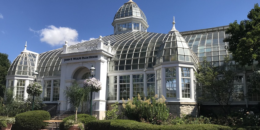 Franklin Park Conservatory building with glass roof and John E. Wolfe palm house signage