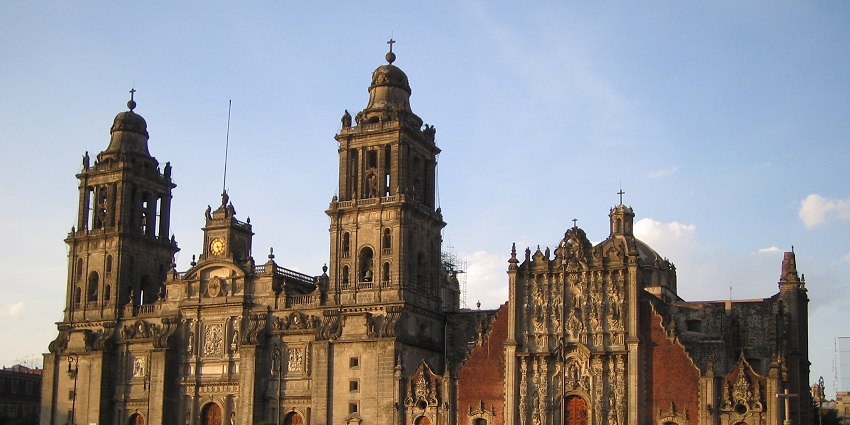 People gather in front of the Mexico City Cathedral at the Historic Center, Mexico.