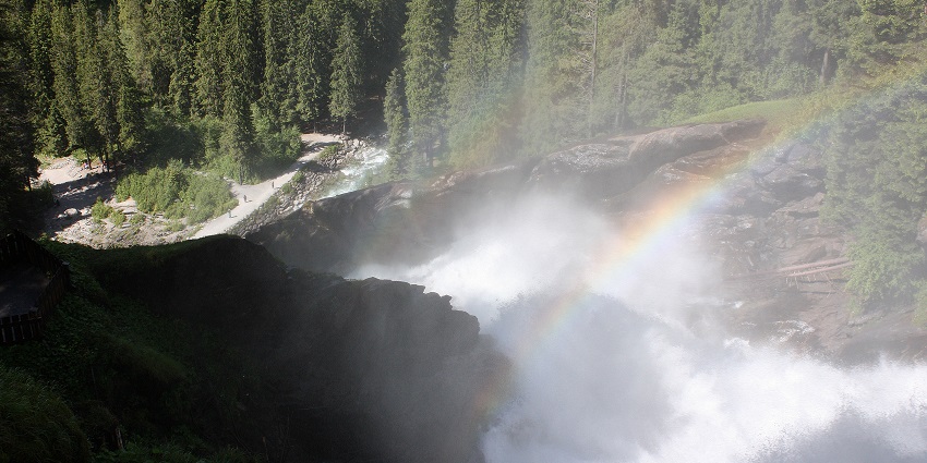 A view of Krimml Waterfalls cascading down the mountainside in Austria's scenic landscape.
