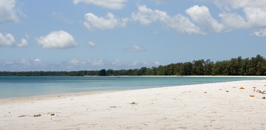 A view of the Vumawimbi Beach, which is less crowded and across it lies greenery.
