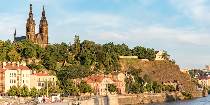 A view of Vyšehrad Fortress in Prague with historic buildings and scenic views.