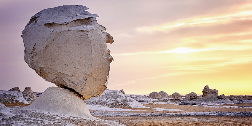 A snow-covered Farafra looks wonderful under the scattered sunlight during the sunset