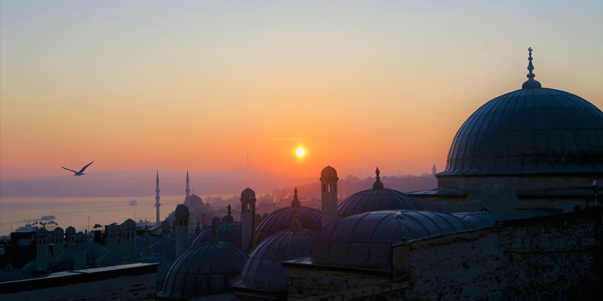 Image of concrete dome buildings during golden hour with picturesque view