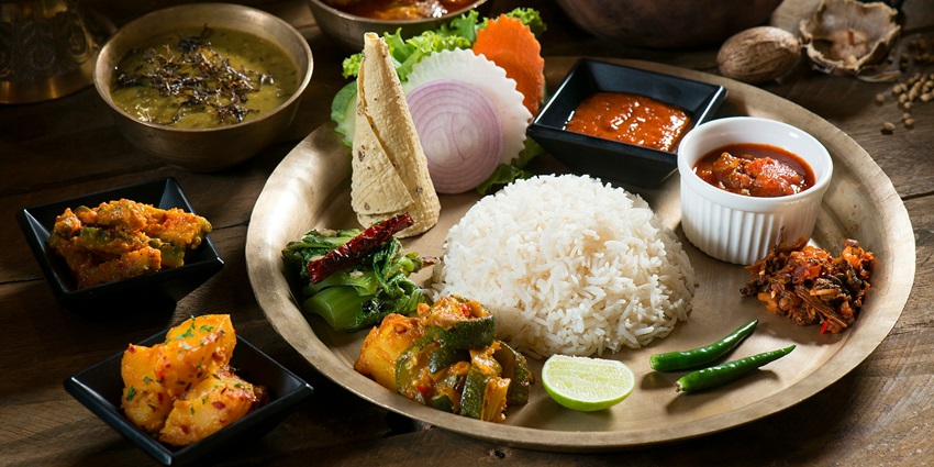 Image of delectable Nepali thali with variety of dishes served on plate