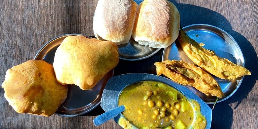 Savor local Goan flavors at charming eateries and beachside shacks near the Alcohol Museum