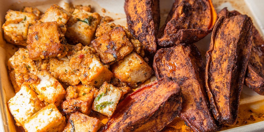 Delicious tofu and yams offered in a hotel near a Radha Swami temple in Agra.