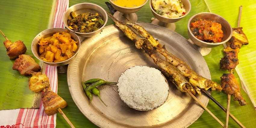 Silghat offers local eateries and small restaurants serving authentic Assamese cuisine.