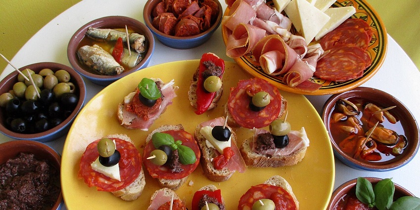 Adelaide city guide offers a culinary scene featuring diverse dishes and desserts.