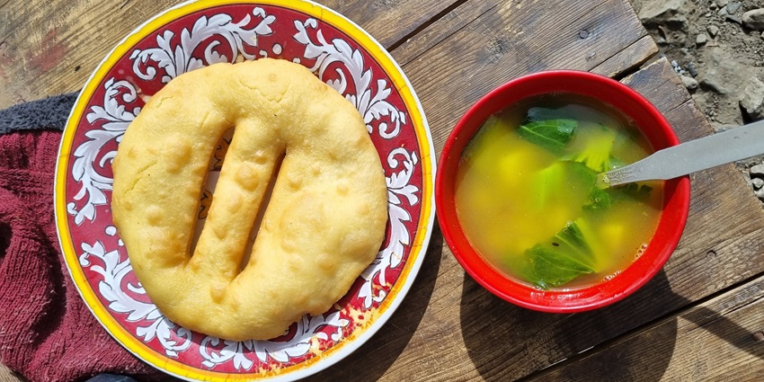 Have Tibetan bread and soup to add culinary delight.