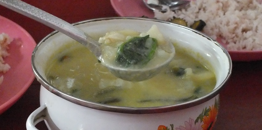 Potatoes and Mustard greens cooked in fermented yak cheese with loads of garlic. At Dirang
