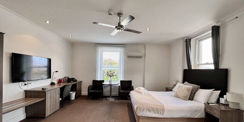 A room in the hotel with decent amenities to stay near the destination.