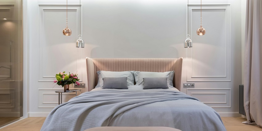 An image showing a comfortable hotel bedroom, thoughtfully designed for ultimate relaxation.