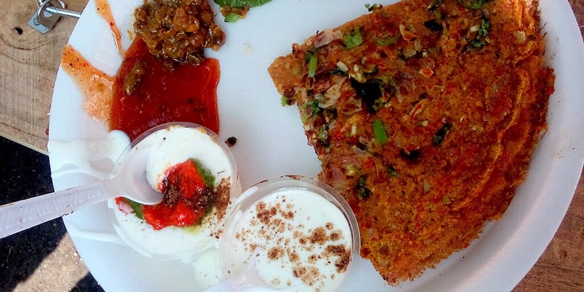Image of besan Chila food - made in Chattisgarh served on a white plate