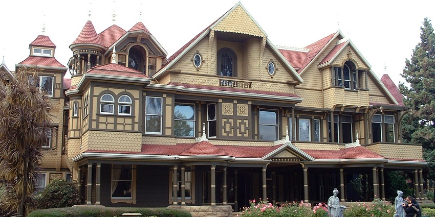 An image of the Winchester Mystery House, a popular haunted place to visit in the US.