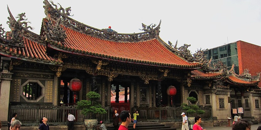 Admire the intricate Taiwanese architecture at Longshan Temple in Taipei.