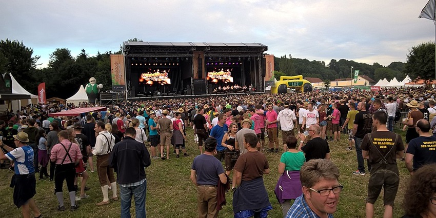 A crowd of people enjoying a brass band performance at the Woodstock der Blasmusik Festival