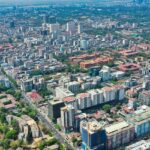 Yangon travel guide highlights the vibrant cityscape with golden pagodas, markets, and green parks.