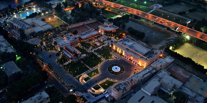 Zamalek island from above with roads, buildings and structures illuminated at night