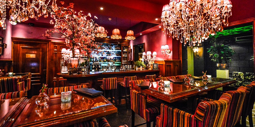 Popular bar in Tel Aviv known for cocktails, laid-back vibe and stunning ocean views.