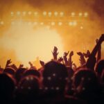 Crowd gathered at the Zanzibar music festival with a band performing on the stage