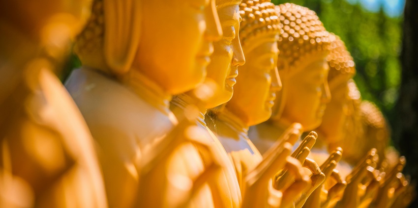 Photo of a Row of Buddha Sculptures - Zorba The Buddha, places to visit in Noida for couples