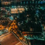 Nile River and Cairo Tower at night with colourful lighting and a bridge over the river