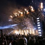 An image showing people doing cheers inside a building, representing Iceland nightlife