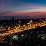 Illuminated infrastructure of Dar es Salaam with residential buildings and roads.