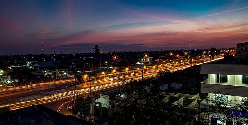 Illuminated infrastructure of Dar es Salaam with residential buildings and roads.