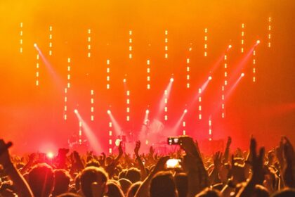 A view of a vibrant nightclub in Sharm El Sheikh with neon lights and dancing crowds.