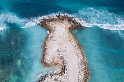 A representative picture of a beach that is ideal for surfers and relaxation seekers