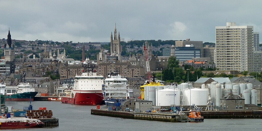 Seaside charm with various ships and picturesque cityscapes at Aberdeen