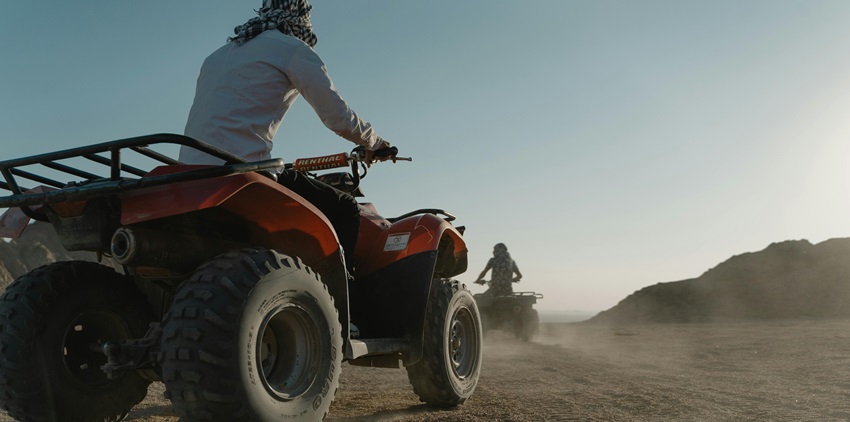 Ride all-terrain vehicles through rugged landscapes and adventurous terrain.