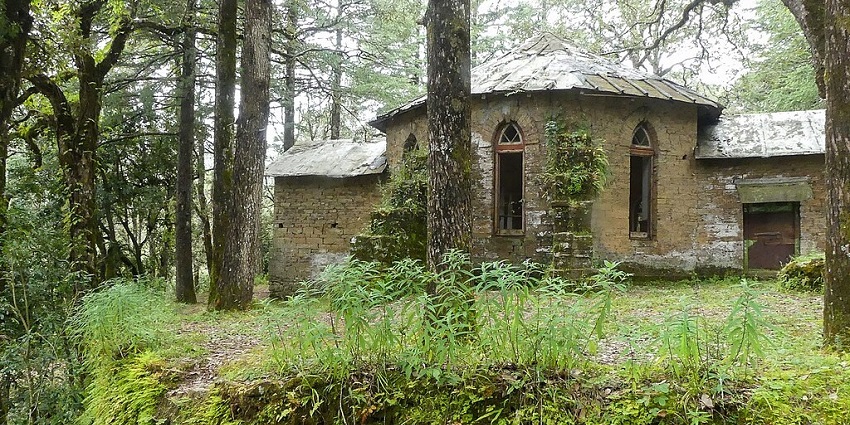 Image of Abbott Mount Church surrounded by lush green forest - places to visit in Lohaghat