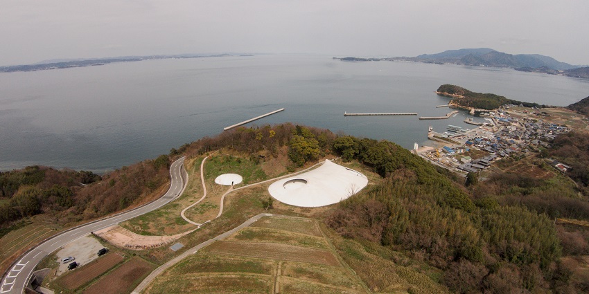 A panoramic view of Teshima Art Museum standing on a hill on the island of Teshima.