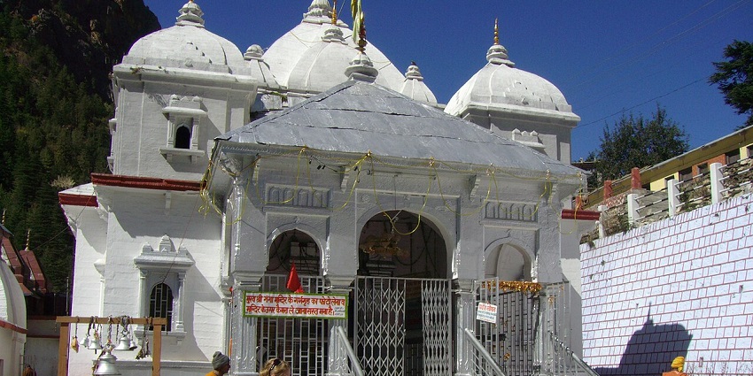Image of Gangotri temple in Uttarakhand during day time view with in front tourists