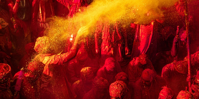 An image of the vibrant celebration of Holi Mahotsav in Vrindavan, Uttar Pradesh, India.