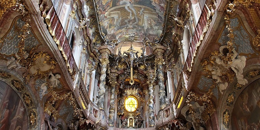 An image of the interior of the Asamkirche, a famous place to visit in Germany.