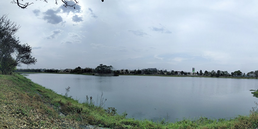 An image of Agara Lake with calm waters, lush greenery, and a peaceful natural setting.
