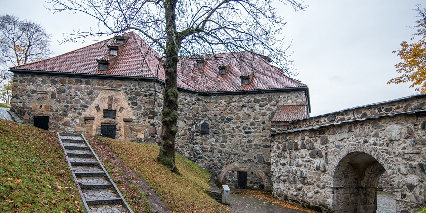 An image showing a medieval castle Akershus Fortress, one of the places to visit in Oslo.