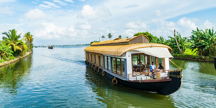 Image of Houseboats floating over the Alleyppey - places to visit in october in South India