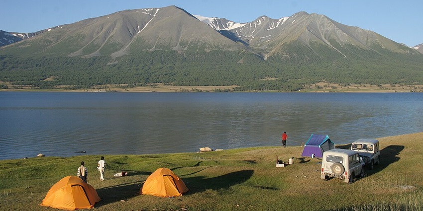 Remote park featuring towering peaks, glaciers, and diverse wildlife.