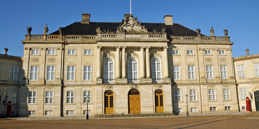 An Image of the Amalienborg Palace, showcasing its neoclassical architecture in Copenhagen